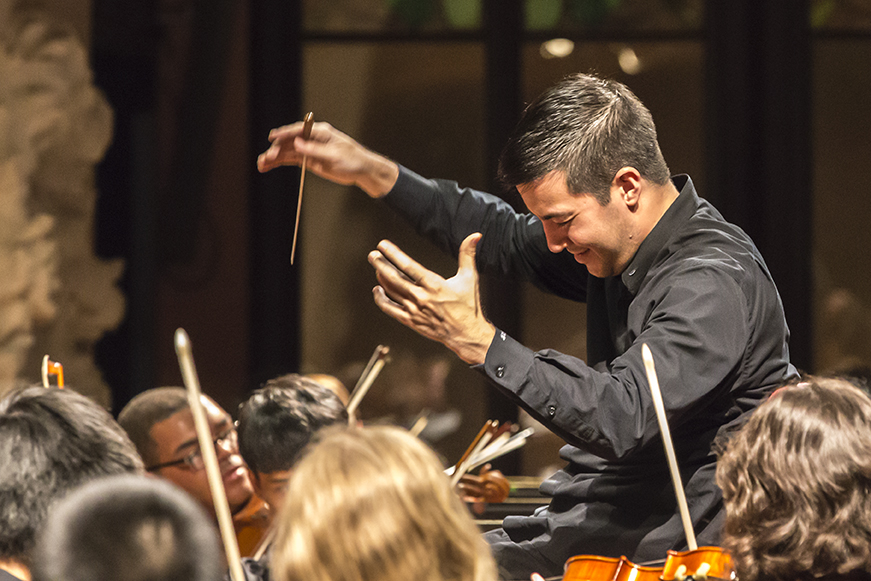 Male conductor conducting